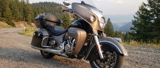 Motorcycle hard covers protecting an Indian Roadmaster saddlebags and tour pack on a mountain switchback